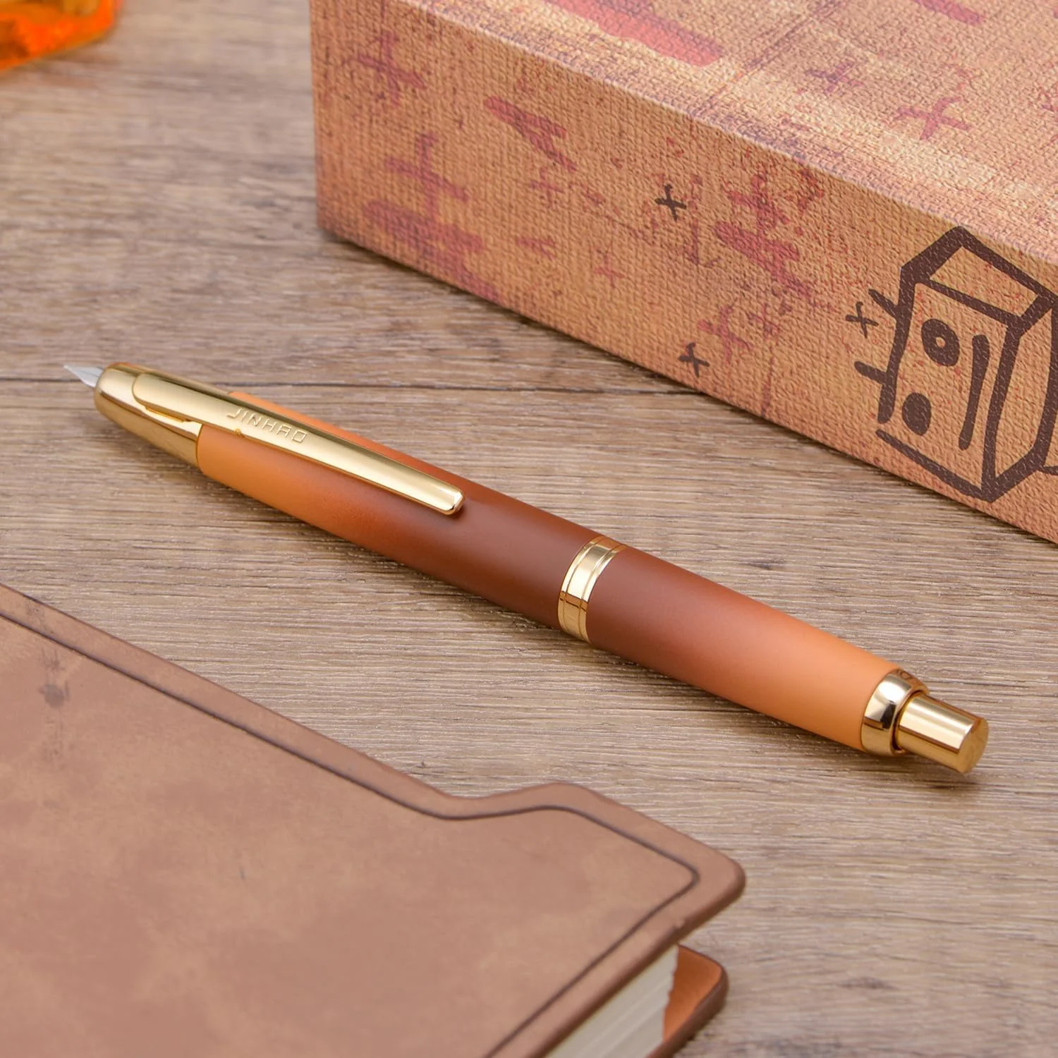 Jinhao 10 Capless Fountain Pen with Box – Marble Red & Caramel Orange, Retractable Fine Iridium Nib, Golden Clip, Ink Converter Set - Image 4