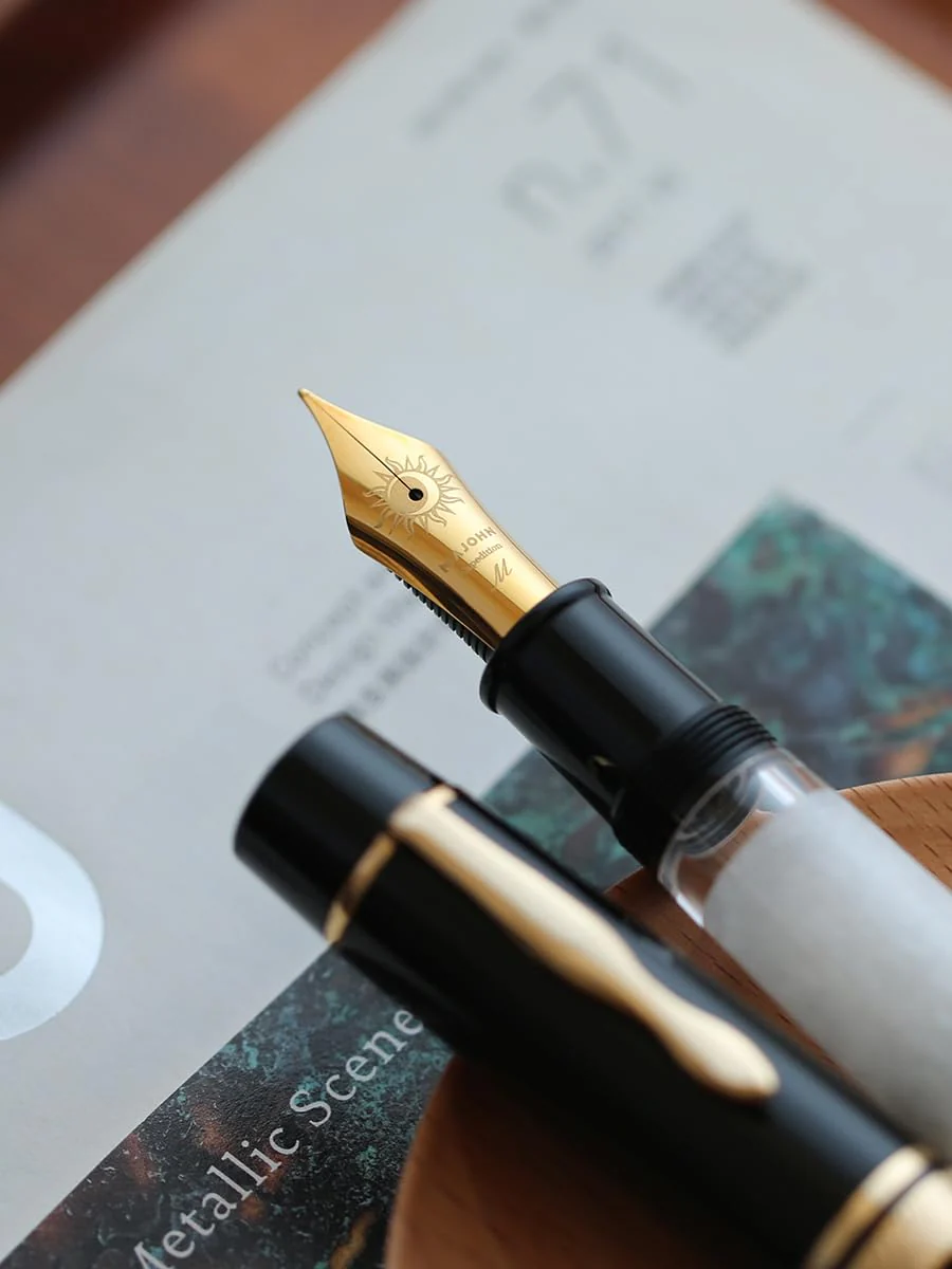 Moonman P139 Sun Carved Fountain Pen – Size 8 Nib, Brass Piston System, Large Capacity Resin (White & Black) - Image 5