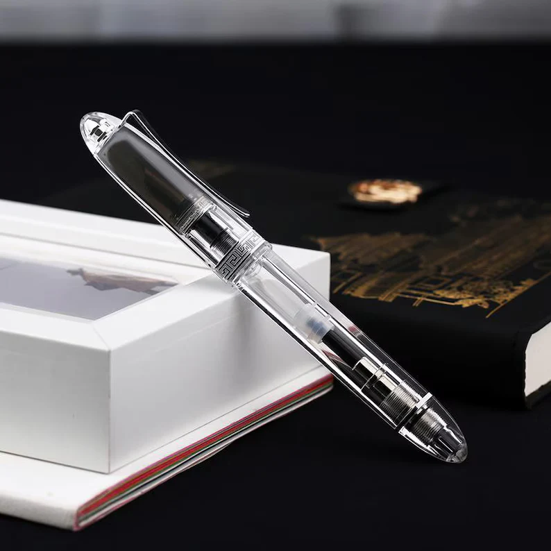 Moonman V60 Clear Transparent Piston Fountain Pen, Fine Nib (0.5mm), Triangular Resin Body, Gift Box Included - Image 2