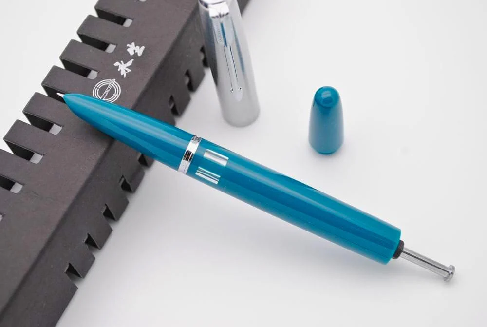 Wing Sung 601 Steel Cap Vacumatic Fountain Pen with Ink Window, Extra Fine Nib (Blue-Green) - Image 5