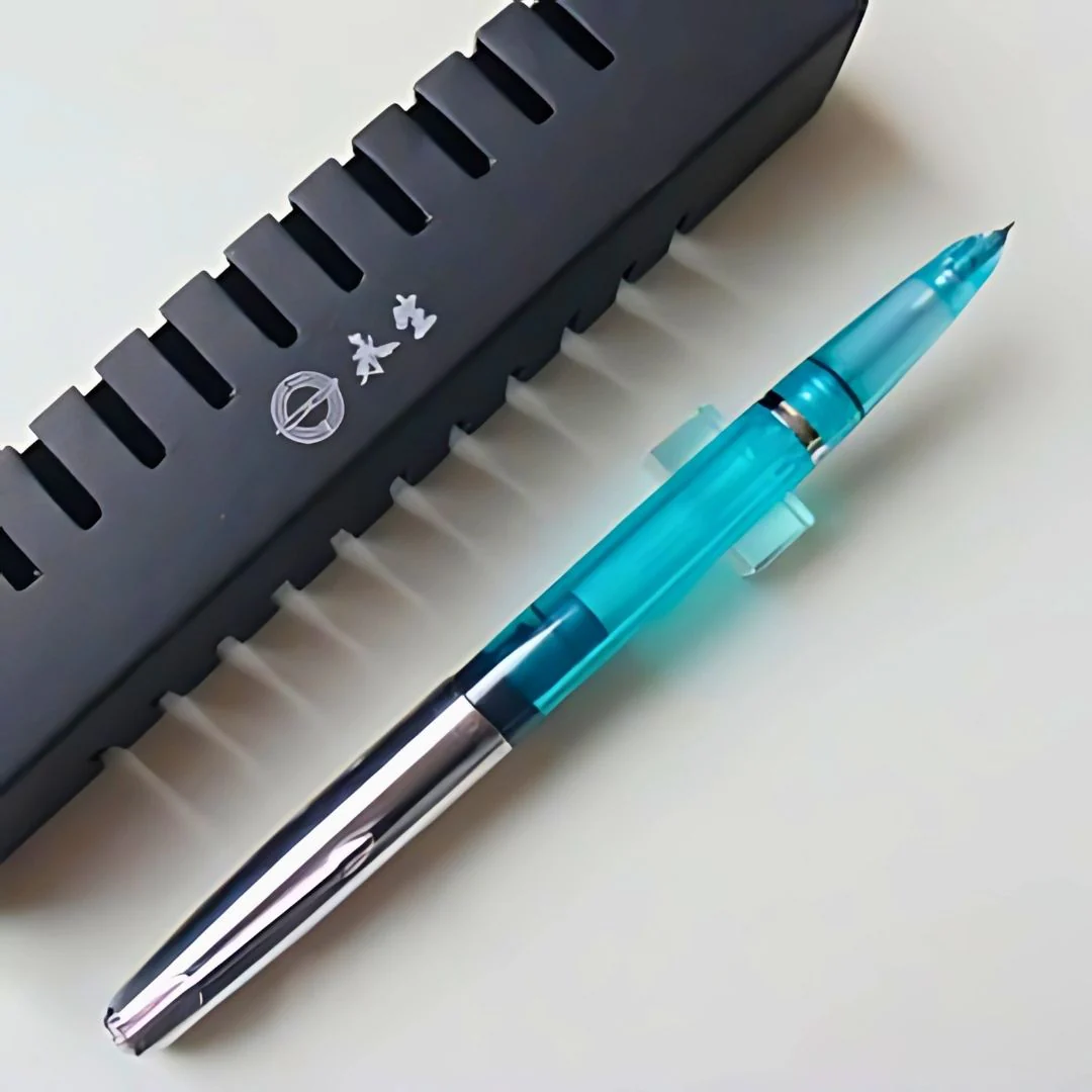 Wing Sung 601 Transparent Blue Vacumatic Fountain Pen – 0.5mm Fine Nib, Resin Body, Steel Cap, Push-Cap with Converter & Box (No Ink) - Image 3