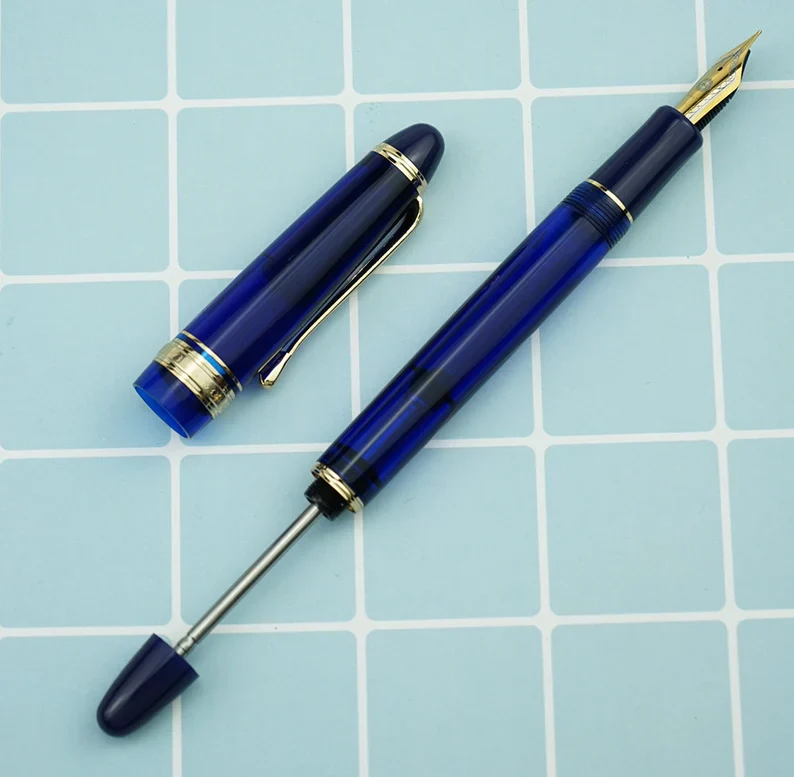 Wing Sung 699 Vacuum Filling Fountain Pen – Extra Fine Dual-Tone Nib, Translucent Blue Acrylic with Gold Clip - Image 2