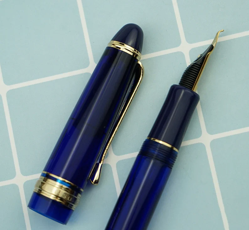 Wing Sung 699 Vacuum Filling Fountain Pen – Extra Fine Dual-Tone Nib, Translucent Blue Acrylic with Gold Clip - Image 3